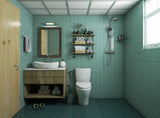 Small Bathroom With Seafoam Tiles And Minimal Storage